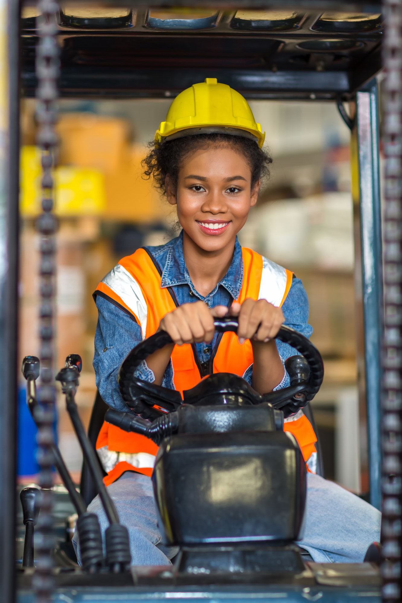 women-worker-at-forklift-driver-happy-working-in-industry-factory-logistic-ship-.jpg